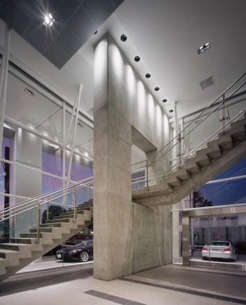 Inox handrail with glass infill installation in the BMW Showroom, LA, CA
