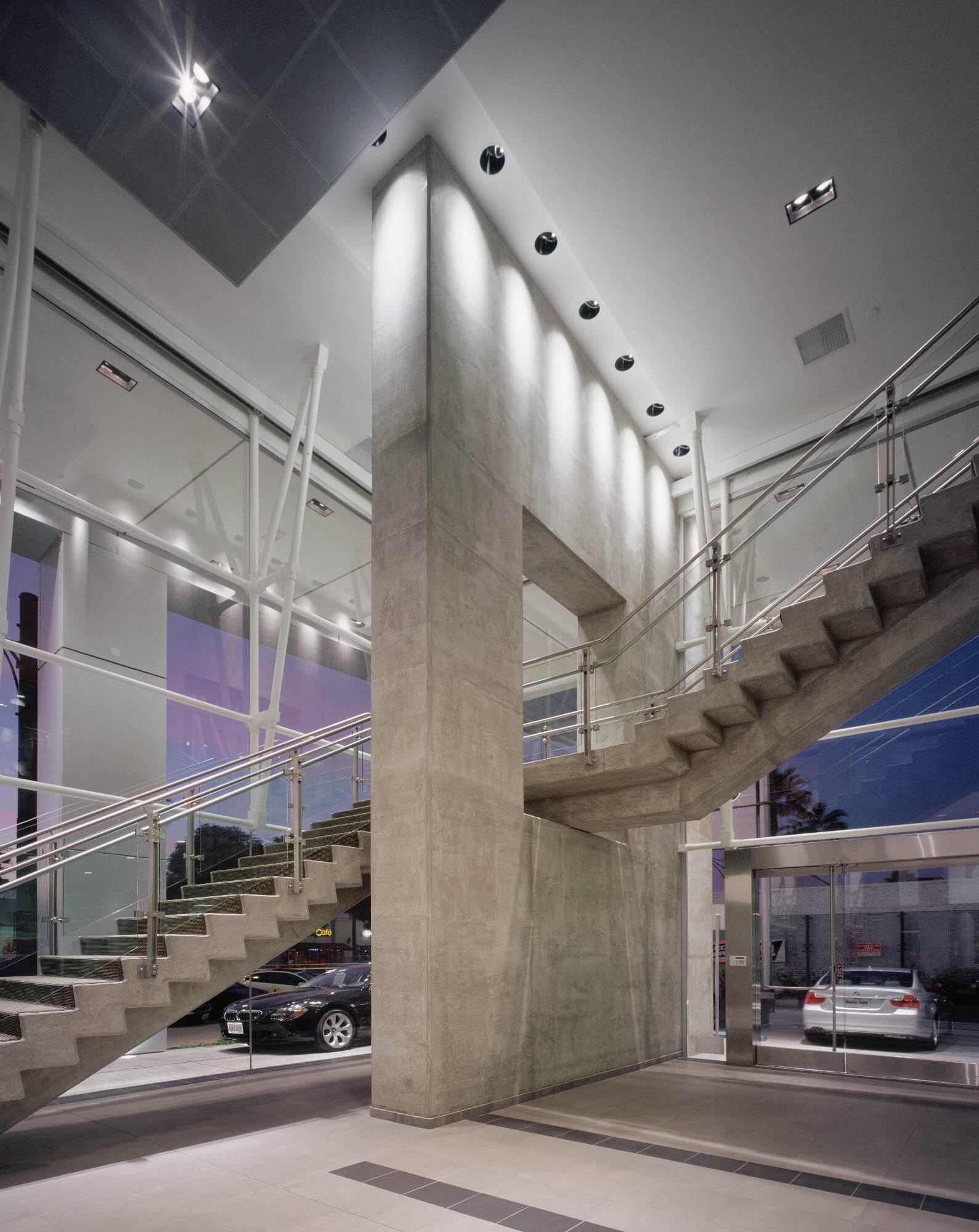 Inox handrail with glass infill installation in the BMW Showroom, LA, CA