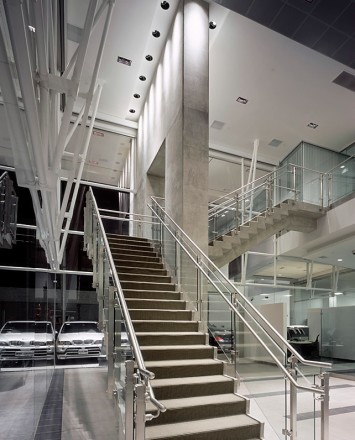 Inox handrail with glass infill installation in the BMW Showroom, LA, CA