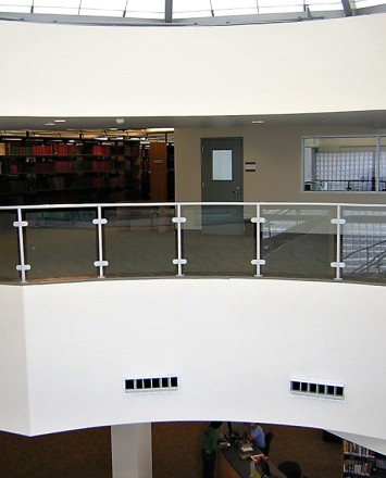 View of balcony Hewi guardrail with glass infill at the College of Sequoias, CA.