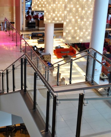 Ferric guardrail with glass infill installation at LA Live Convention Center, CA.