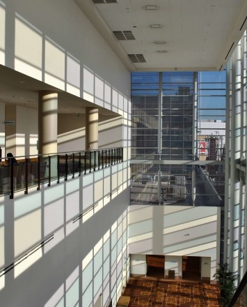Ferric guardrail with glass infill installation at LA Live Convention Center, CA.
