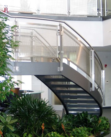 Inox curved stair rail with stainless steel infill installation at an EZ Storage, Baltimore, MD
