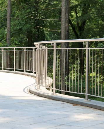 Outdoor office walkway Circum curved handrail installation at Gap International, PA.
