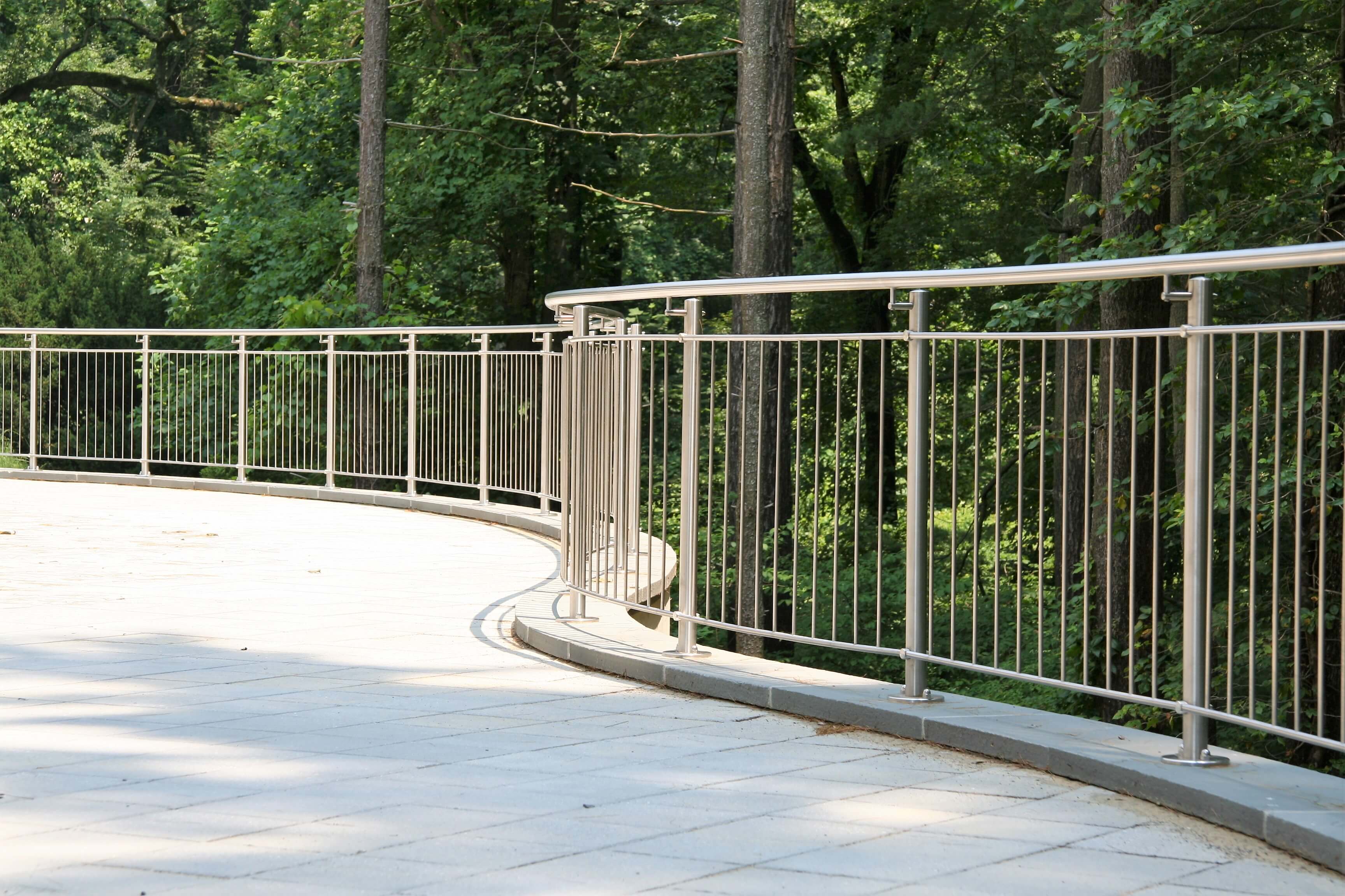 Outdoor office walkway Circum curved handrail installation at Gap International, PA.