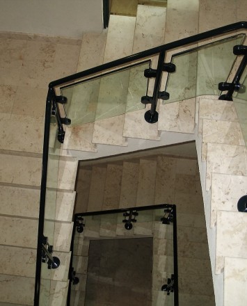 Ariel view of looping stairwell with Hewi guardrail with glass infill panels at Stanford Bank, Antigua.
