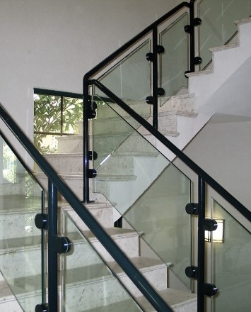 Stanford Bank, Antigua, HEWI guardrail surface mounted with clear glass infill panels