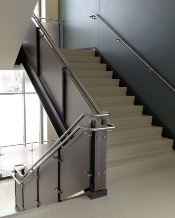 Closeup of Ferric guardrail with carbon fiber resin infill installation at Fox Valley Tech, WI.