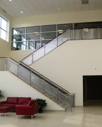 Circum leather and stainless steel handrail installation at American Leather, TX.