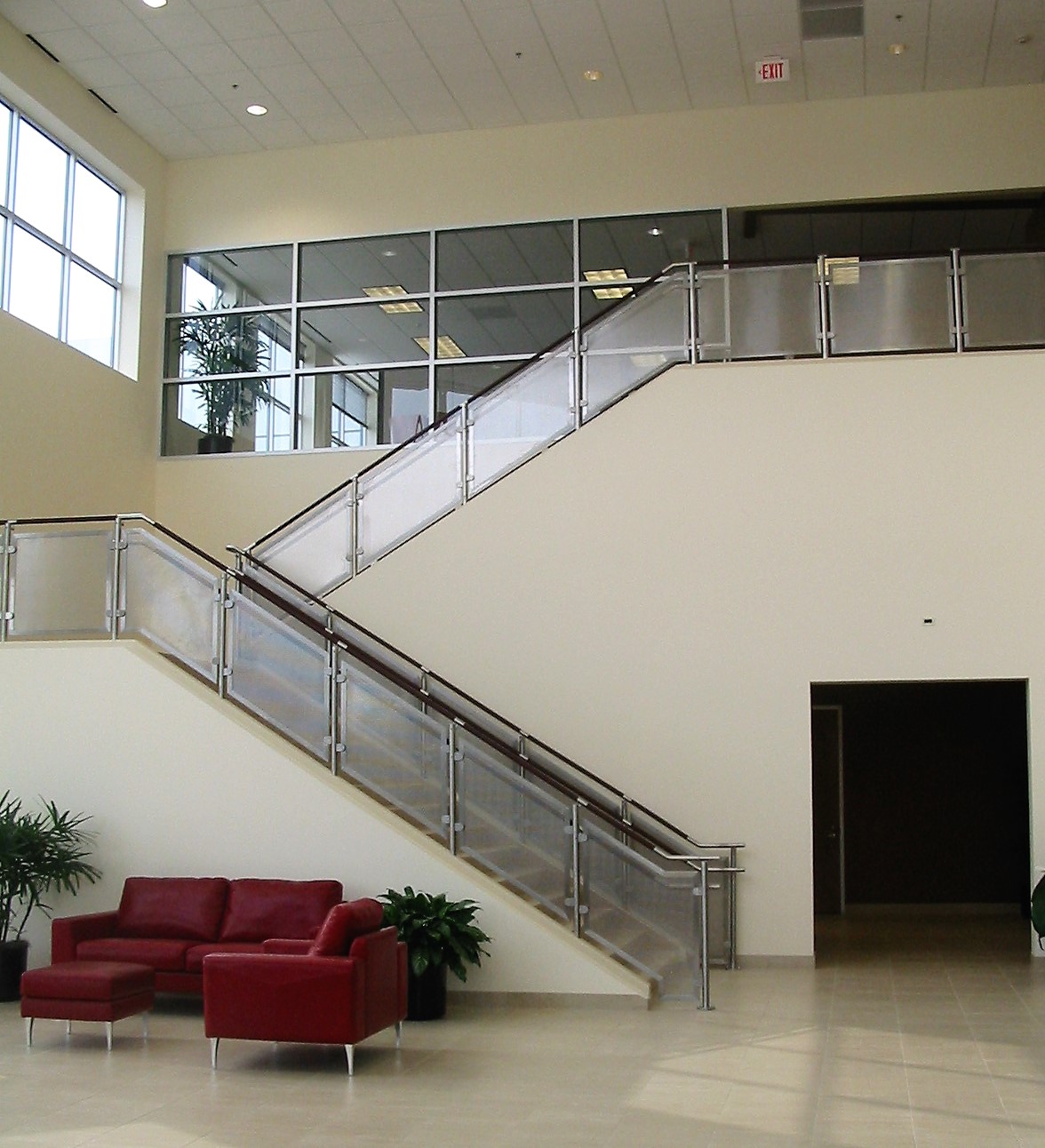 Circum leather and stainless steel handrail installation at American Leather, TX.