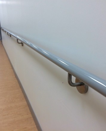 HEWI wall mounted handrails throughout building corridors at the Lighthouse Guild, NY