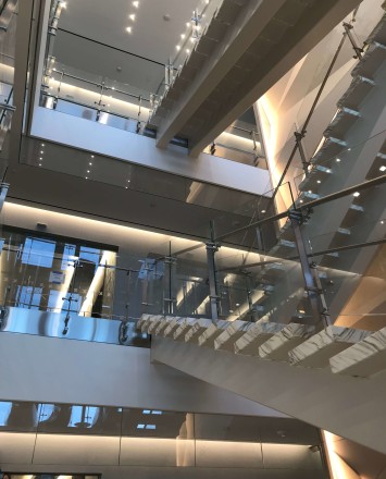 Atrium stair at Market Axess offices, Kubit glass railing system.