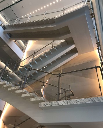 Atrium stair at Market Axess offices, Kubit glass railing system.