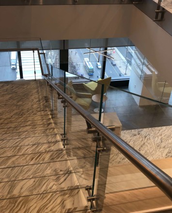 Atrium stair at Market Axess offices, Kubit glass railing system.