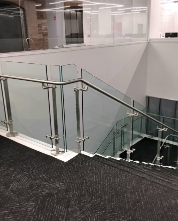 Stair at HOK Architects offices, DC, Kubit glass railing system.