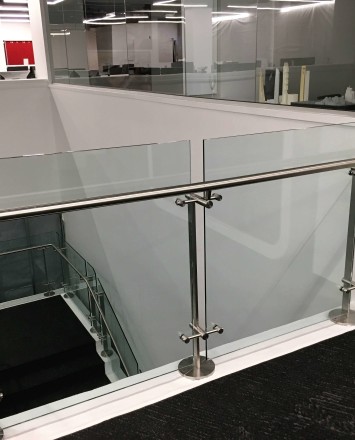 Stair at HOK Architects offices, DC, Kubit glass railing system.