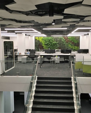 Stair at HOK Architects offices, DC, Kubit glass railing system.
