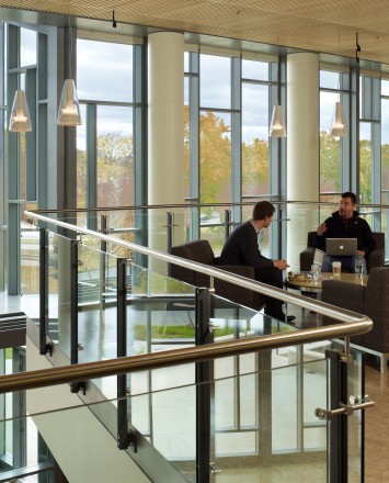 Ferric guardrail with glass infill installation at MIT Sloan School of Management, MA.