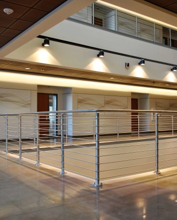 Circum round guardrail with stainless steel infill rails at Mission College, CA.