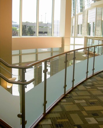 Circum guardrail installation with partially etched glass infill at Mercy Medical Center, OH.