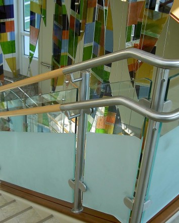 Circum guardrail installation with partially etched glass infill at Mercy Medical Center, OH.