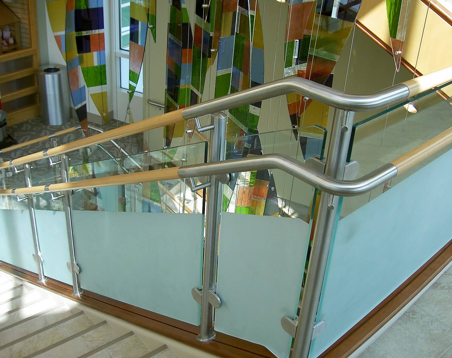 Circum guardrail installation with partially etched glass infill at Mercy Medical Center, OH.