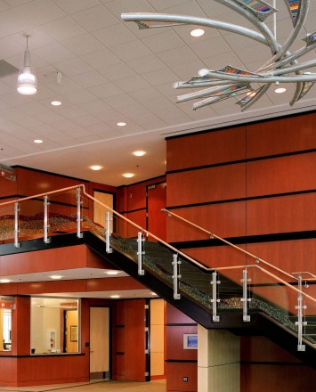 inox guardrail with cast patterned glass infill installation at the Hillsboro Civic Ctr, OR.