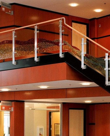 inox guardrail with cast patterned glass infill installation at the Hillsboro Civic Ctr, OR.