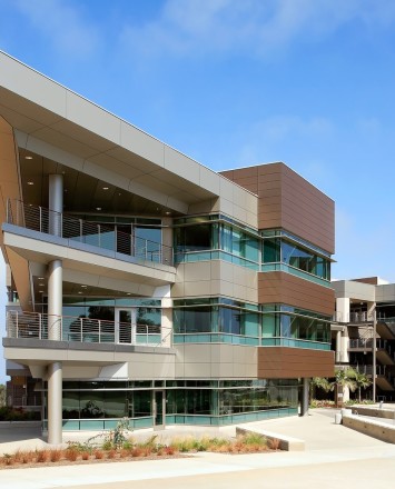 Circum wood handrail installation with horizontal infill rails at the Rady Schoolof Business, CA.