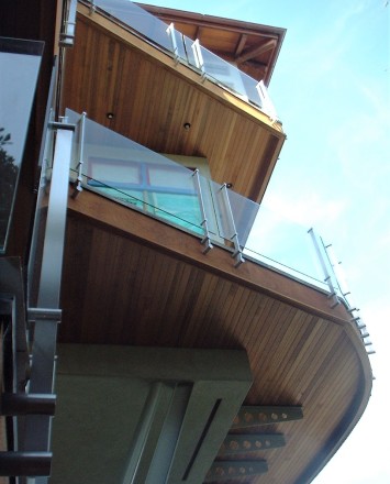 Ground level upward view of Kubit handrail system with glass infill at a Private California Residence