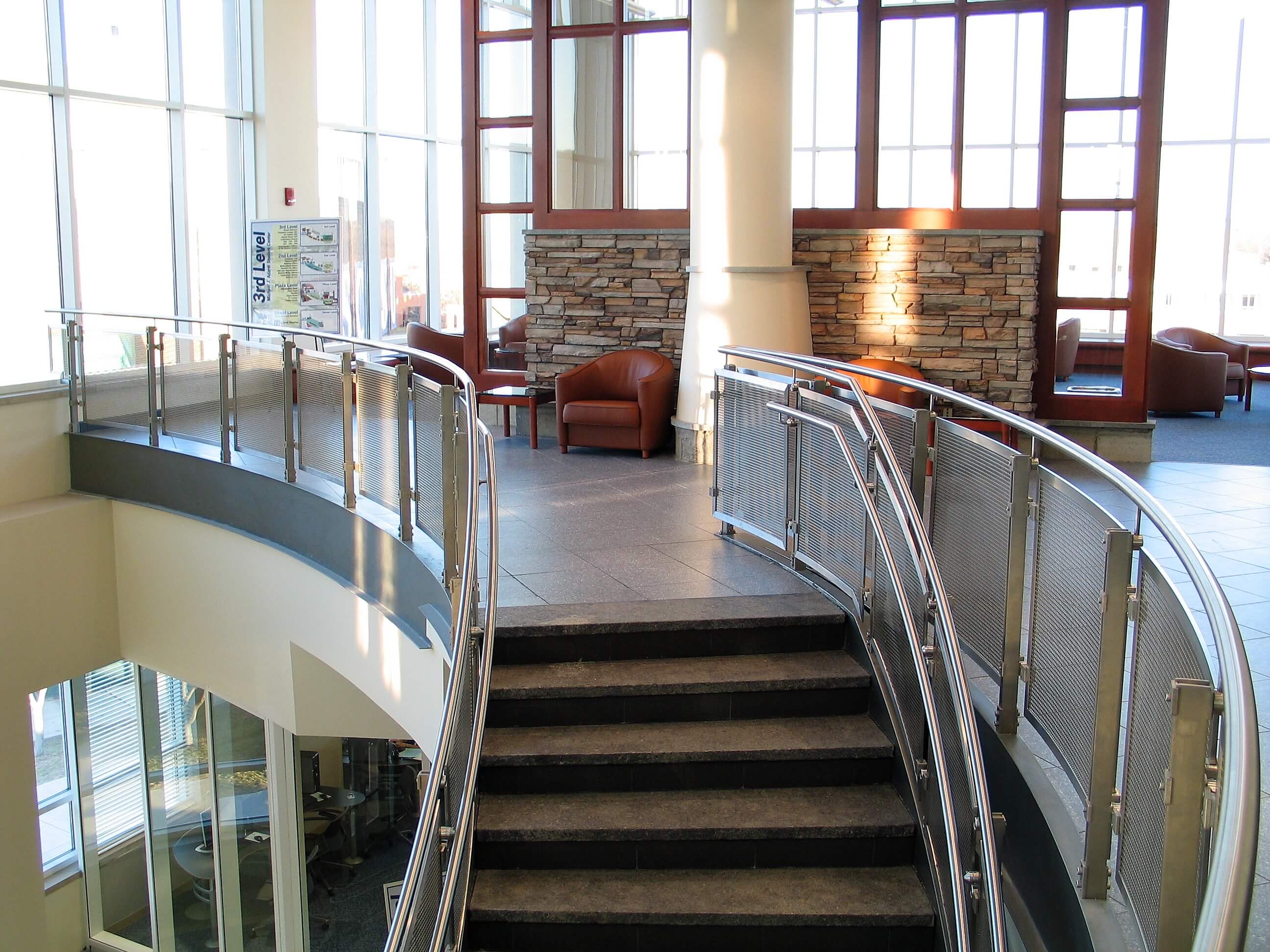 Inox curved handrail with stainless steel infill installation at Southern Connecticut State University, CT.