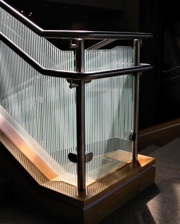 Circum guardrail with vertically etched glass infill installation at CTI Lobby