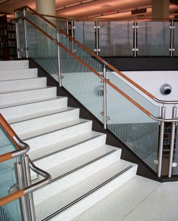 Circum handrail with glass infill installation at the Fox Lake Library, IL.