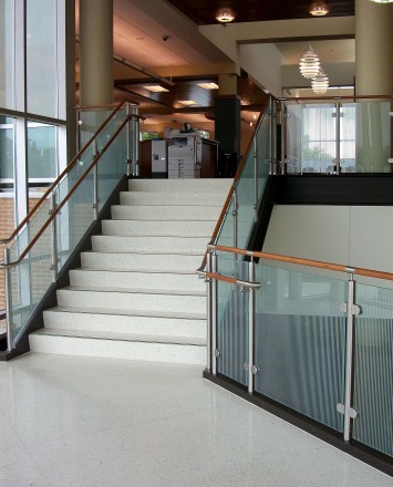 Circum handrail with glass infill installation at the Fox Lake Library, IL.
