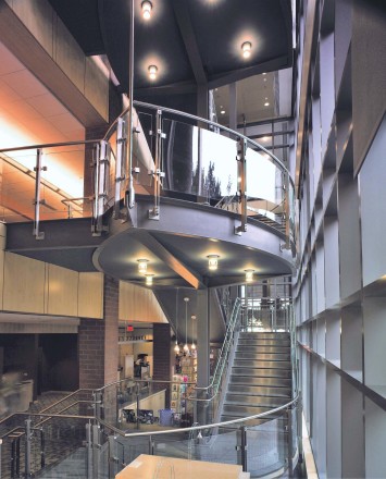 Inox curved handrail with glass infill installation at Princeton Public library, NJ.