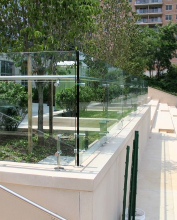 Outdoor balcony view of K Hovnanian HQ, NJ, Kubit short posts with glass infill panels and attached handrail