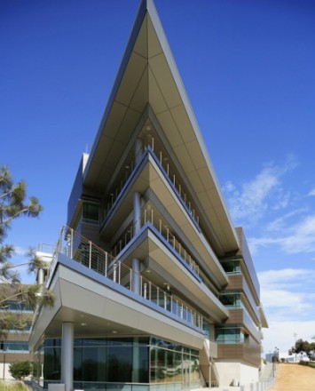 Circum wood handrail installation with horizontal infill rails at the Rady Schoolof Business, CA.