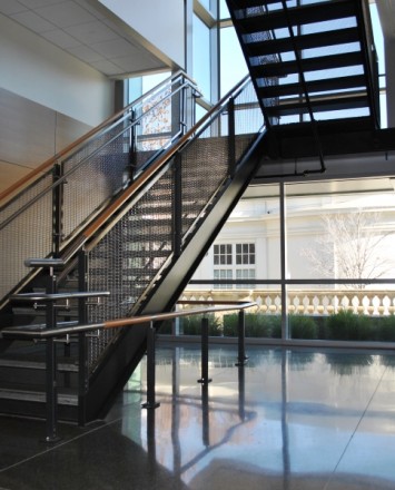 Open entryway at De Anza College, CA, Ferric guardrail with stainless steel posts and woven mesh infill panels