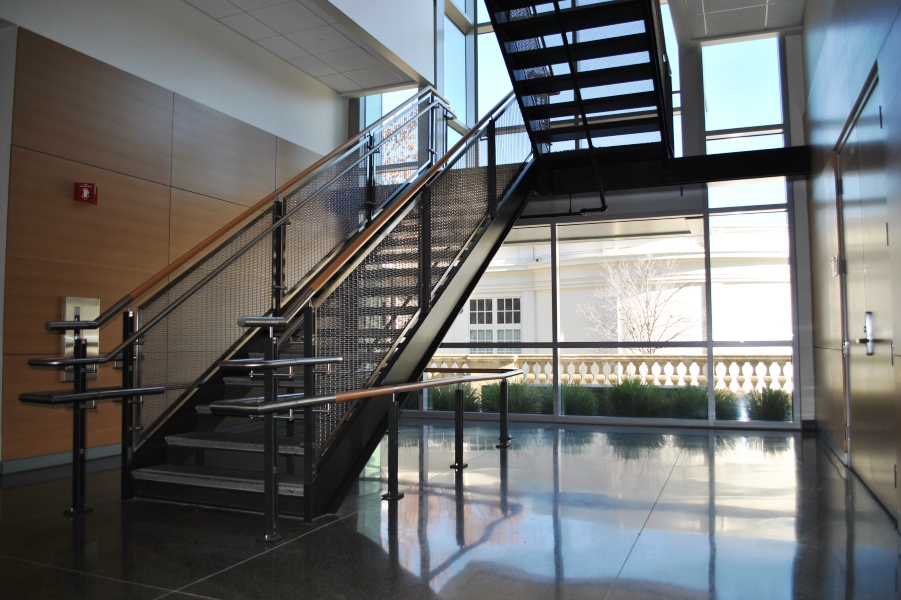 Open entryway at De Anza College, CA, Ferric guardrail with stainless steel posts and woven mesh infill panels