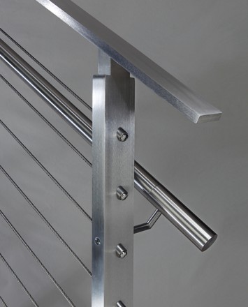 Closeup of stainless steel metal infill railing connections