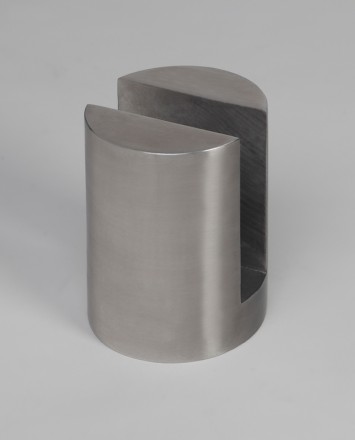 Closeup Studio shot of metal round Optik POD mounting hardware