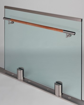 Closeup Studio shot of 2 metal round Optik POD mounting hardware with glass infill & wood rail