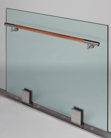 Closeup Studio shot of 2 metal square Optik POD mounting hardware with glass infill & wood rail