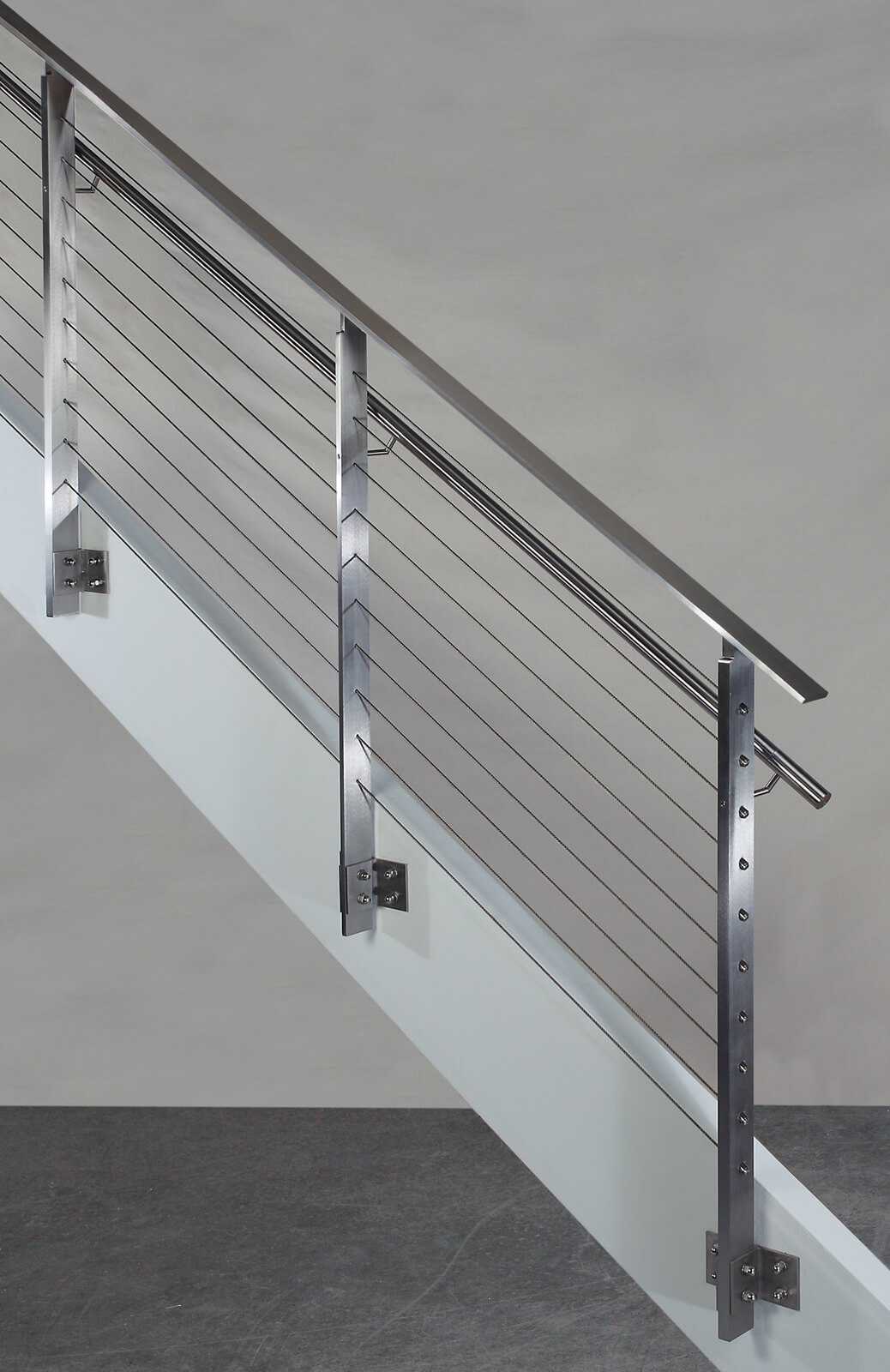 Side view of KOTO, side mounted railing with stainless steel handrail and top cap