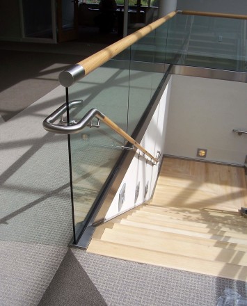 Downward view of Office, PA, Optik Shoe with wood cap staircase