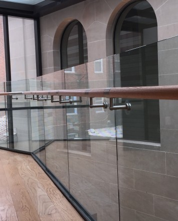 Corner view of Mount Pleasant Library, Washington DC, Optik Shoe with wood handrail and LED