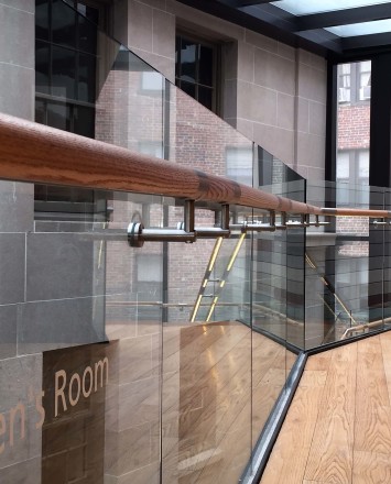 Close angle view of Mount Pleasant Library, Washington DC, Optik Shoe with wood handrail and LED