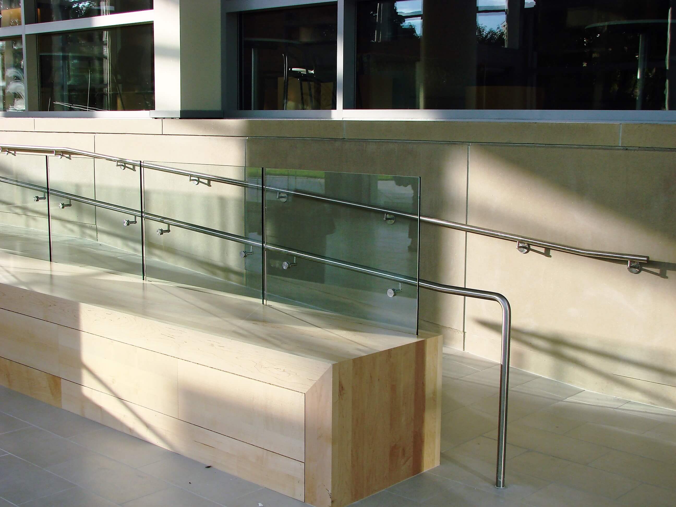 Outdoor ADA wheelchair ramp at the Slavin Center, Providence RI, Optik Shoe recessed into wall / seating area
