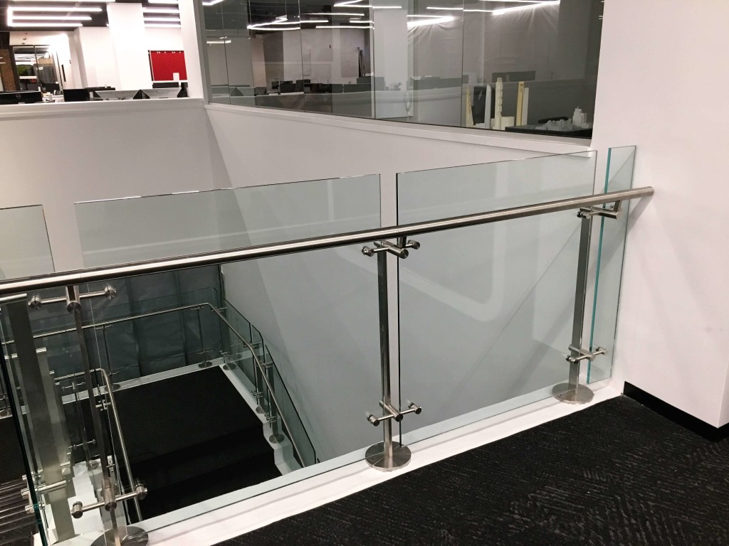 Stair at HOK Architects offices, DC, Kubit glass railing system.